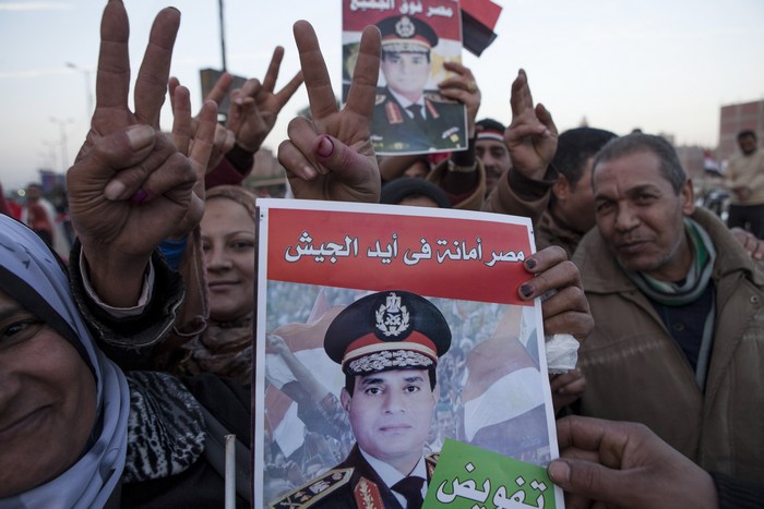 Сторонники министра обороны Египта Абдель Фаттах аль-Сиси голосуют за проект новой конституции. Каир, 15 января, 2014 года. Фото: Ed Giles/Getty Images