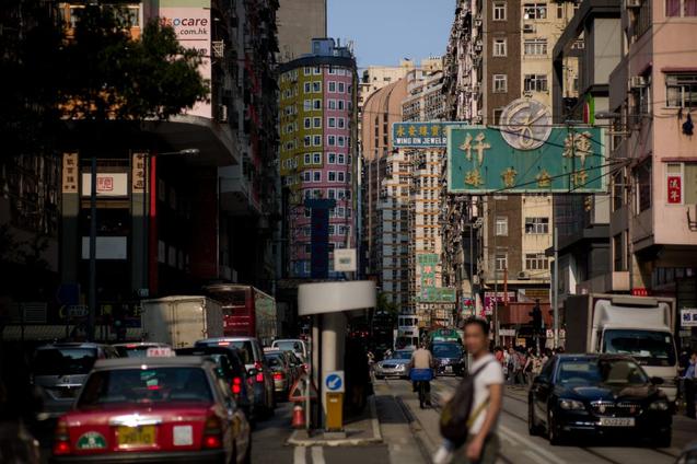 Даже за красивым фасадом Гонконга бушует неослабевающая борьба за власть в коммунистической партии Китая. Фото: PHILIPPE LOPEZ/AFP/Getty Images | Epoch Times Россия