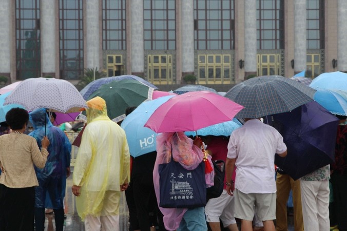 Проливные дожди обрушились на Китай, Пекин, 2 сентября, 2014 год. Фото: ChinaFotoPress/ChinaFotoPress via Getty Images | Epoch Times Россия