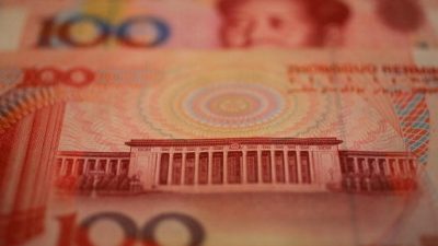 Власти Китая стимулируют экономику с помощью печатания юаней