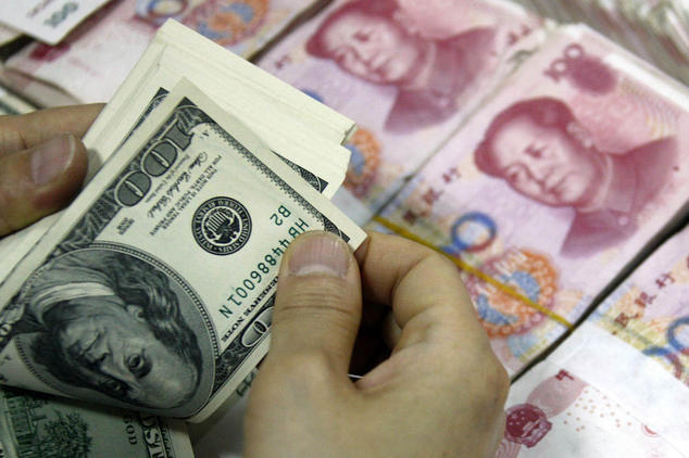 Общий спад роста китайской экономики усложнил жизнь частным инвесторам. В последнее время в Китае стали пропадать владельцы инвестиционных компаний, имеющих крупные долги. Фото: STR/AFP/Getty Images | Epoch Times Россия