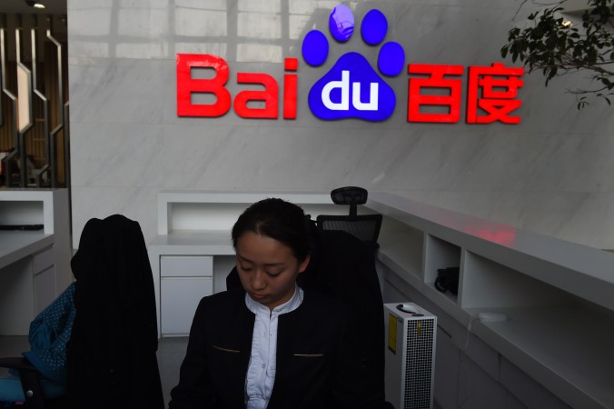 Регистратор в Baidu, Пекин, 17 декабря 2014 г. Фото: Greg Baker/AFP/Getty Images | Epoch Times Россия