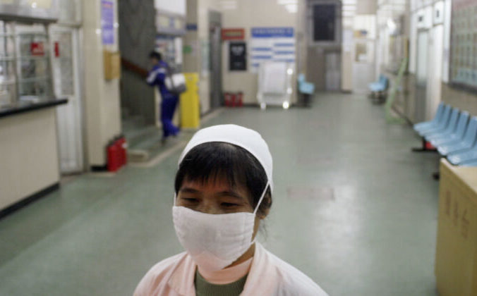 Китайская медсестра Getty Images | Epoch Times Россия