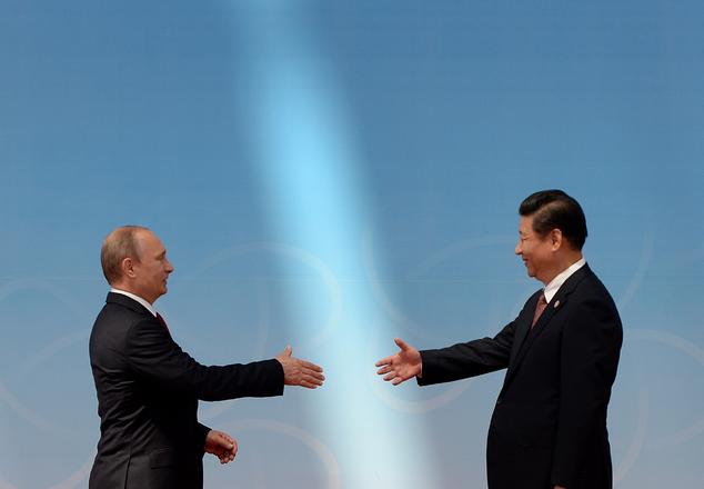 Владимир Путин и китайский президент Си Цзиньпин. Фото: MARK RALSTON/AFP/Getty Images | Epoch Times Россия