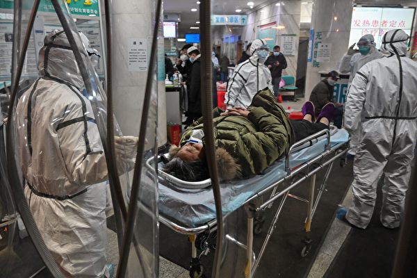 Больница в Ухане. (HECTOR RETAMAL/AFP via Getty Images) | Epoch Times Россия