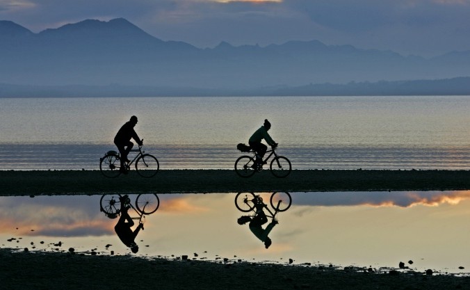 Езда на велосипеде полезна и для нас, и для нашей планеты. Фото: Diether Endlicher/Getty Images | Epoch Times Россия