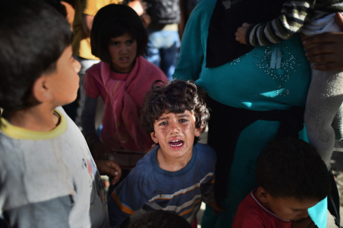 Дети-беженцы находятся в наиболее уязвимом положении, так как легко могут стать жертвами преступников. Фото: Jeff J Mitchell/Getty Images | Epoch Times Россия