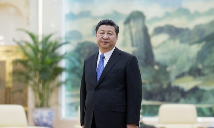 Лидер Коммунистической партии Китая Си Цзиньпин в Большом зале народных собраний в Пекине 25 марта 2016 г. (LINTAO ZHANG / AFP / Getty Images) | Epoch Times Россия