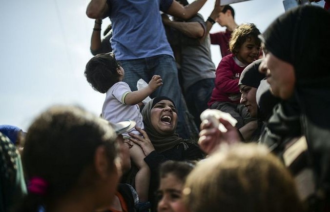 Мигранты протестуют против депортации в Турцию. Фото: BULENT KILIC/AFP/Getty Images | Epoch Times Россия