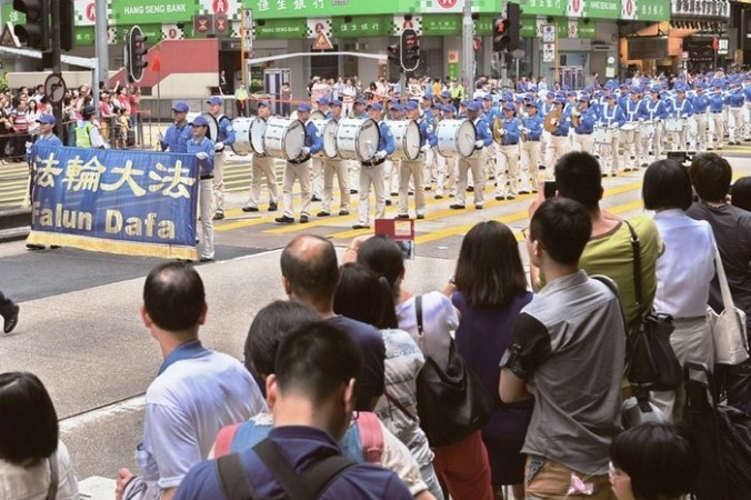 Мероприятия сторонников Фалуньгун, посвящённые годовщине исторической апелляции 25 апреля 1999 года. Гонконг. Апрель 2014 года. Фото: minghui.org | Epoch Times Россия
