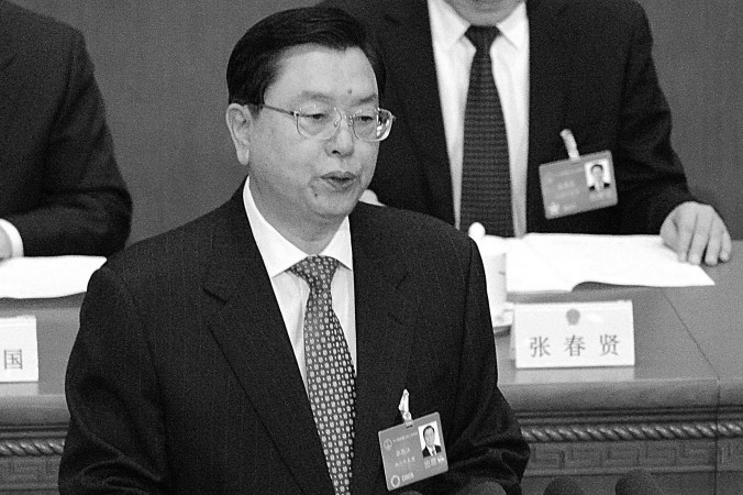Чжан Дэцзян, председатель Постоянного комитета Всекитайского собрания народных представителей, выступает с докладом в Пекине 9 марта 2014 г. Фото: Goh Chai Hin/AFP/Getty Images) | Epoch Times Россия