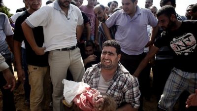 На Западном берегу реки Иордан десятки тысяч людей простились с убитыми подростками