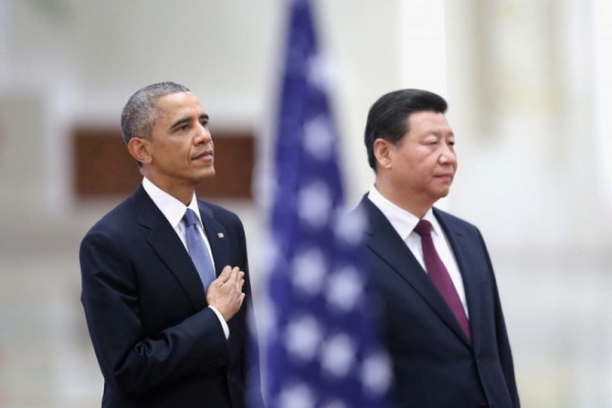 Президент США Барак Обама и председатель КНР Си Цзиньпин. Фото: Getty Imges | Epoch Times Россия