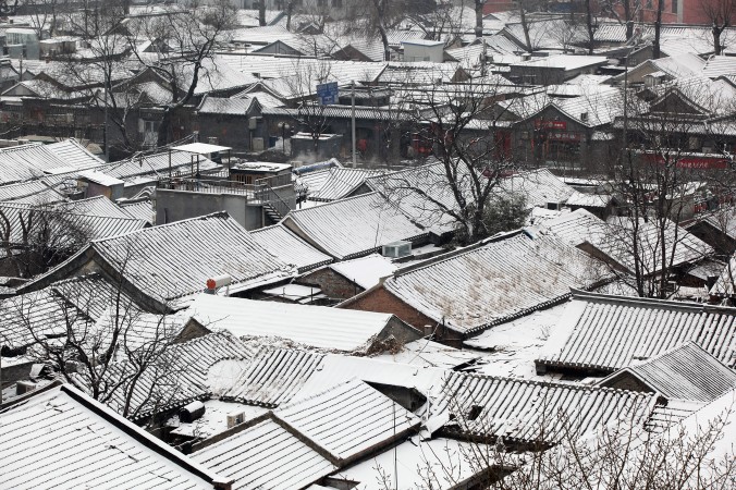 Покрытый снегом хутун в Пекине 10 февраля 2011 г. Фото: Feng Li/Getty Images | Epoch Times Россия