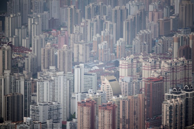 Вид на Шанхай, 8 мая 2015 г. Фото: JOHANNES EISELE/AFP/Getty Images | Epoch Times Россия