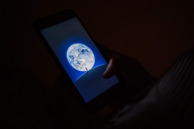 Экран загрузки WeChat. (Anthony Wallace/AFP/Getty Images) | Epoch Times Россия
