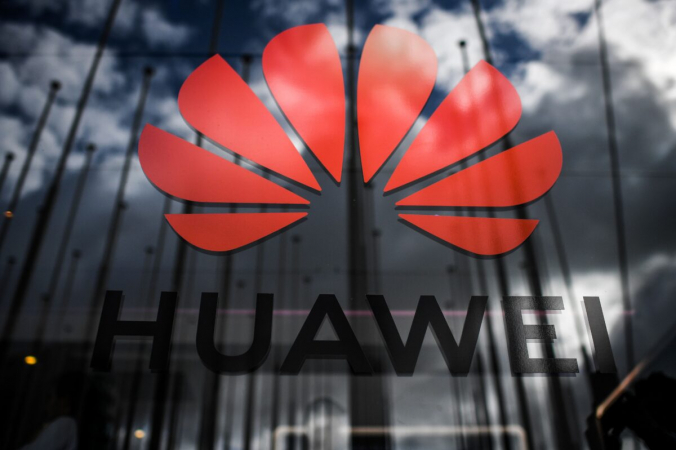 Изоброжение логотипа китайского телекоммуникационного гиганта Huawei во время веб-саммита в Лиссабоне 6 ноября 2019 г. (Патрисия Де Мело Морейра / AFP через Getty Images) | Epoch Times Россия