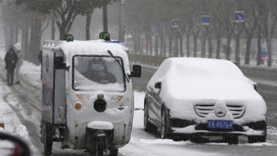 Пекин внезапно накрыло снежным покрывалом