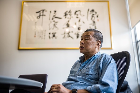 Джимми Лай, 72 года, в офисе Next Digital в Гонконге. (Photo: ANTHONY WALLACE/AFP via Getty Images)