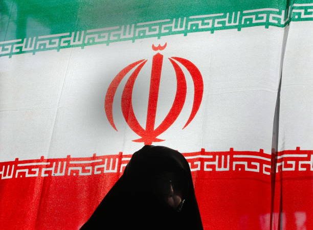 Флаг Ирана. Фото: BEHROUZ MEHRI/AFP via Getty Images) | Epoch Times Россия