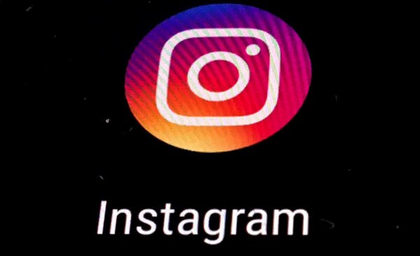 Логотип приложения Instagram отображается на экране мобильного телефона в Лос-Анджелесе 29 ноября 2018 года. Фото: Damian Dovarganes/AP Photo