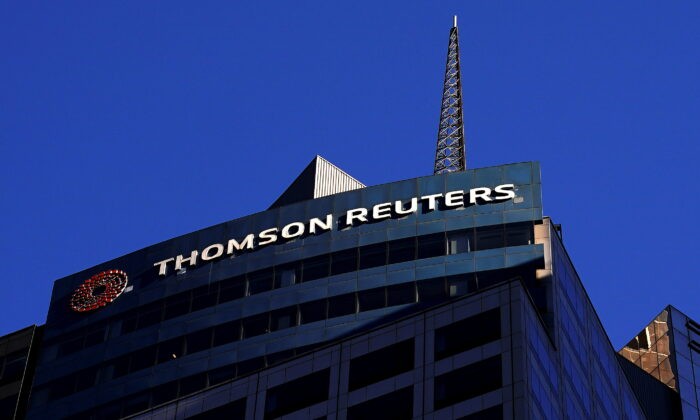 Логотип ThomsonReuters на здании в Нью-Йорке на фотографии из файла. (CarloAllegri/Reuters)
 | Epoch Times Россия