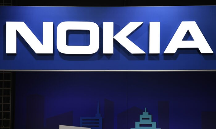 Логотип Nokia представлен на Всемирном мобильном конгрессе (MWC) в Барселоне, Испания, 25 февраля 2019 г. (Габриэль Буйс/AFP через Getty Images | Epoch Times Россия