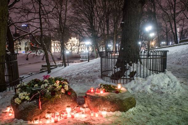 Импровизированный мемориал погибшим в 30-ю годовщину смертоносного нападения советских войск на баррикады, защищаемые сотнями тысяч протестующих за независимость в Риге, Латвия, 20 января 2021 года. Фото:  GINTS IVUSKANS/AFP via Getty Images | Epoch Times Россия