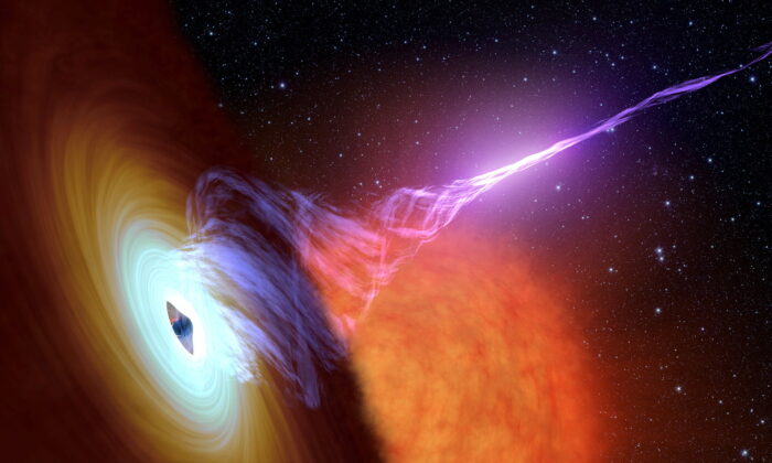 Художник изобразил чёрную дыру с аккреционным кольцом, плоской структурой материала, вращающейся вокруг чёрной дыры, и струей горячего газа, называемого плазмой, 30 октября 2017 года. (NASA/JPL-Caltech/Handout via Reuters) | Epoch Times Россия