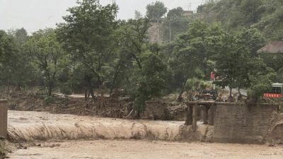 Наводнение в Китае унесло жизни не менее 12 человек, тысячи эвакуированы