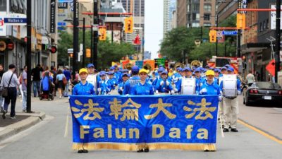 Приверженцы Фалуньгун провели масштабный парад в Торонто, призывая прекратить преследование в Китае