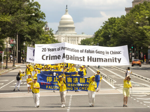 Последователи Фалуньгун принимают участие в параде, посвящённом 20-й годовщине преследования Фалуньгун в Китае. Вашингтон 18 июля 2019 года. Фото: Samira Bouaou/The Epoch Times