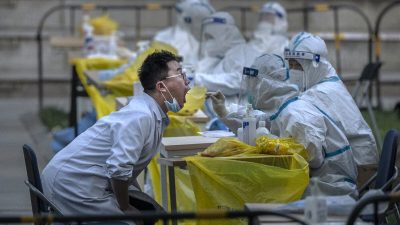 В китайском городе тестируют на нуклеиновую кислоту, несмотря на отмену ВОЗ режима ЧС по COVID-19