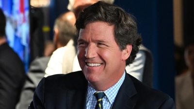 Такер Карлсон во время вручения премии FOX Nation Patriot Awards 2022 года в Голливуде, штат Флорида, 17 ноября 2022 года. (Jason Koerner/Getty Images)