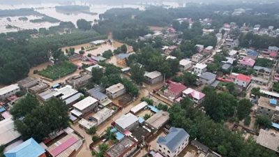 Огромные экономические потери в городе, затопленном для спасения политических центров Китая