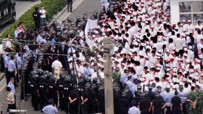 Замедление экономики Китая приводит к массовым увольнениям и протестам