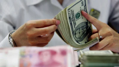 Китайский юань колеблется, девальвационное давление усиливается