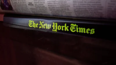 Логотип New York Times на газетной стойке в магазине у дома в Вашингтоне, 6 августа 2019 г. (Alastair Pike/AFP via Getty Images)