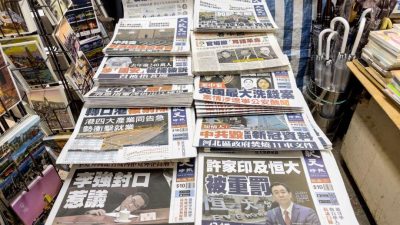 Газетные киоски в Гонконге получают угрозы за продажу газет The Epoch Times