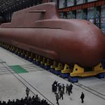 Ким Чен Ын наблюдает за испытаниями ракет большой дальности и ядерной подводной лодки