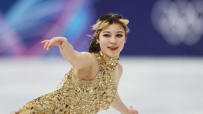 Фигуристка Алиса Лью в золотом платье, Олимпиада-2026